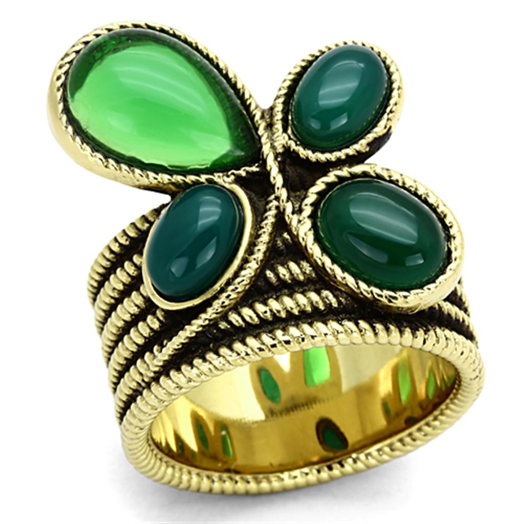 A gold plated clover-leaf ring